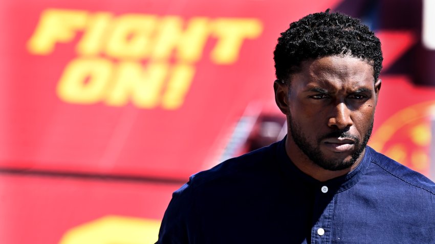 Former USC running back Reggie Bush speaks to the media ay the Coliseum Wednesday during a press conference to get his Heisman Trophy back.